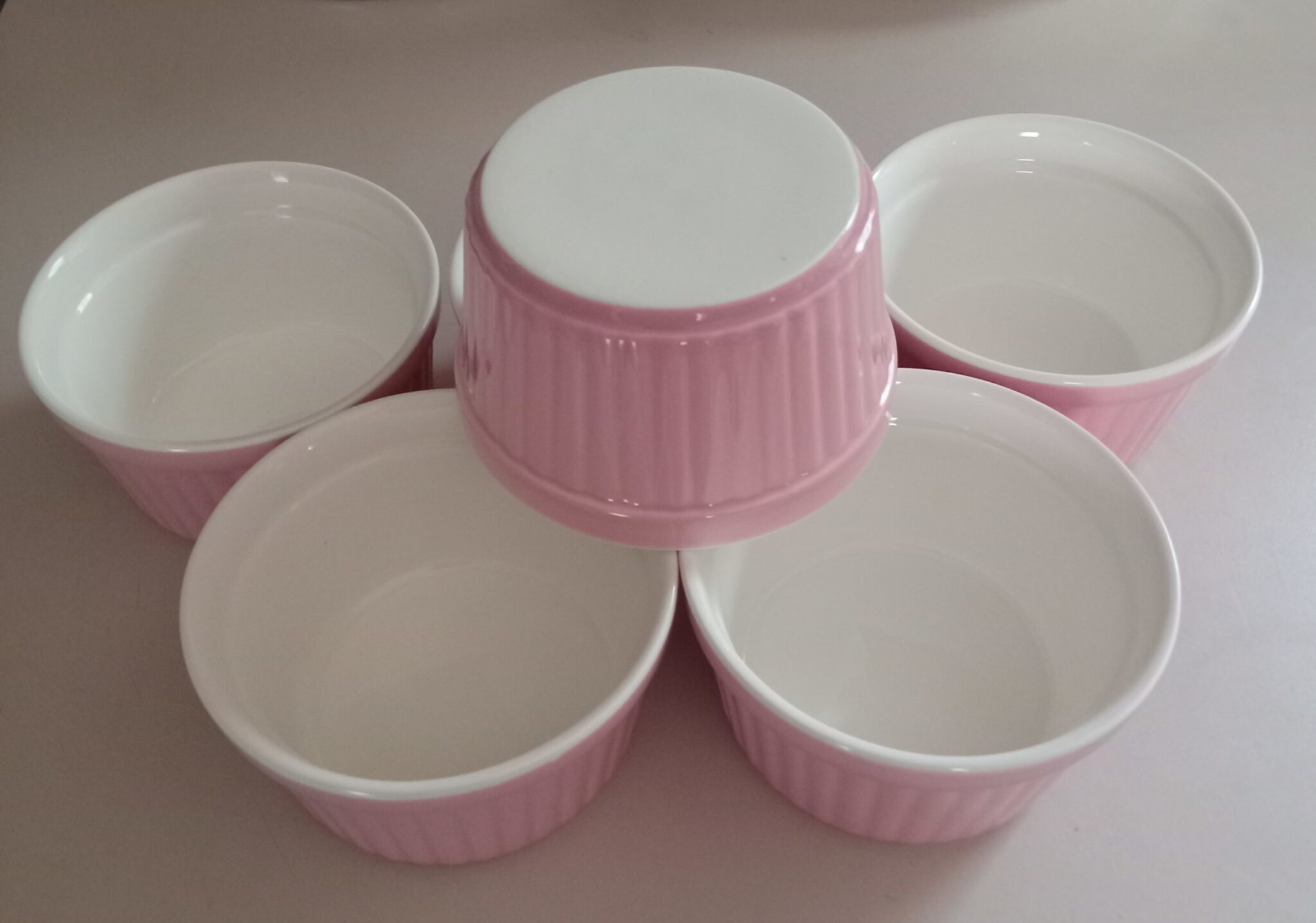 Pink ramekin baking dishes, ceramic ramekins, individual baking dishes, pink kitchen decor, ramekin baking cups, cute baking dishes, feminine baking accessories, pastel pink ramekins, small baking dishes, personal-sized desserts