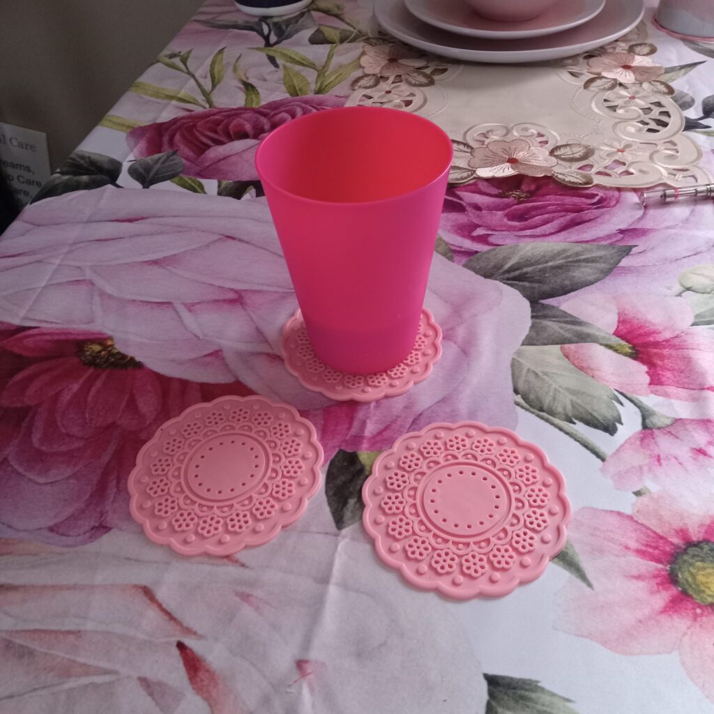 Pink Silicone Coaster Set, pink coasters, coaster set review, silicone coasters, floral coasters, pink kitchen decor, table protection, stylish coasters, pink dining accessories, functional coasters, coaster condensation issue, Amazon coaster review