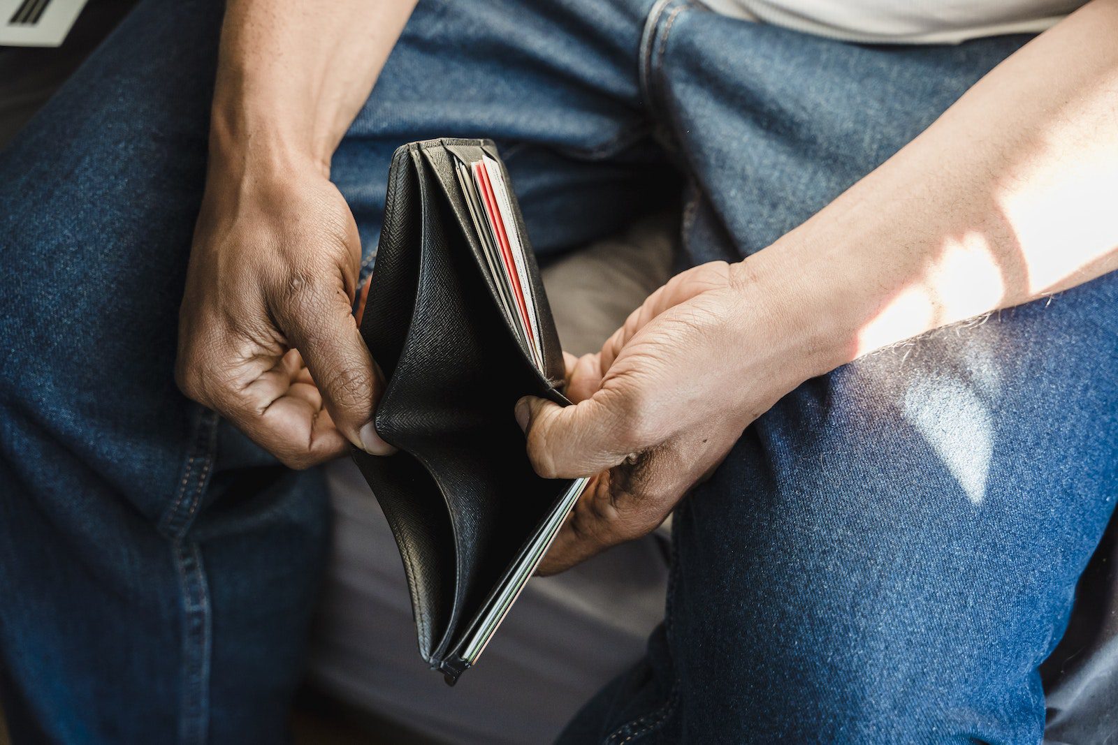 Man Looking at an Empty WalletSurviving a Recession: Navigating Rising Costs and Limited Budgets