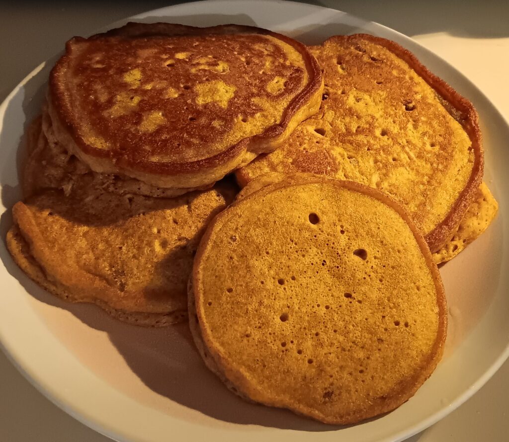 Pumpkin Pecan Pancakes, Southern Pumpkin Pancakes, fall breakfast recipe, spiced pancakes, pumpkin pie pancakes, pecan pancakes, homemade pancakes, fall pancake recipe, Southern food blog, breakfast ideas, pumpkin recipes, pecan recipes, fluffy pancakes, easy pancake recipe, seasonal breakfast recipes, Southern breakfast recipes, pancakes with pecans, pumpkin pancakes with syrup, skillet pancakes, homemade pancake batter