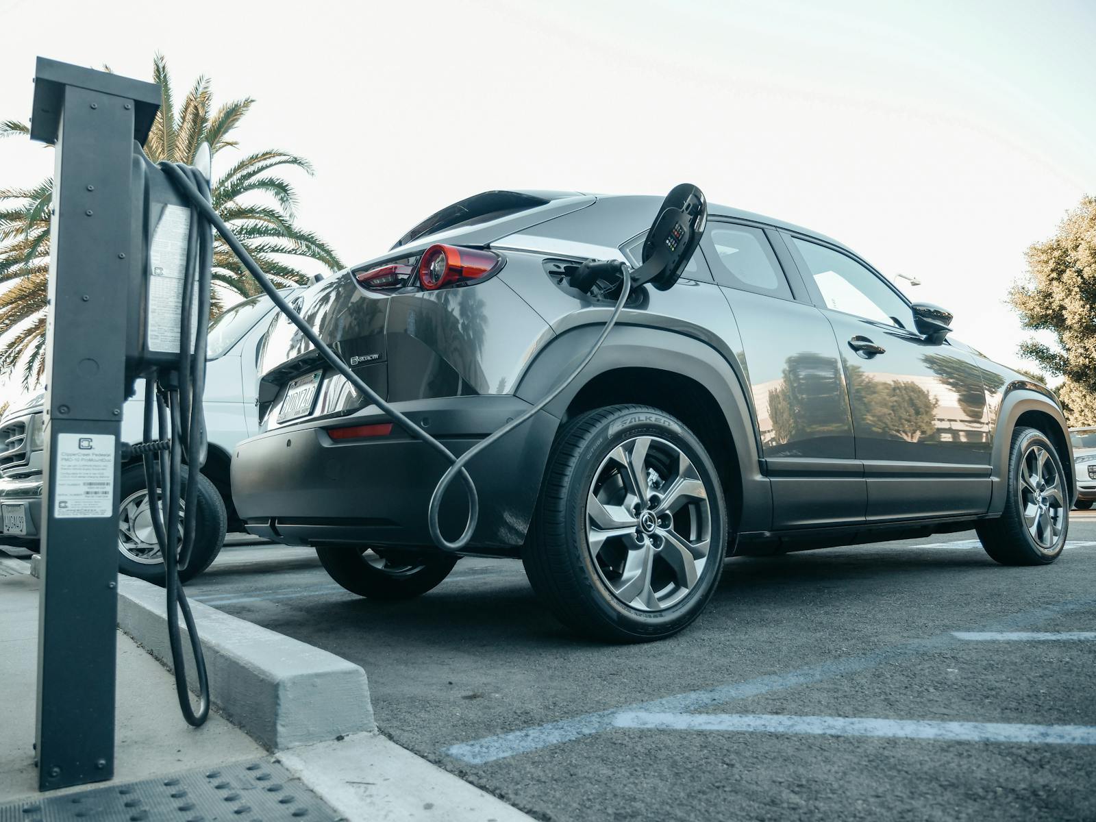 electric vehicle industry EV problems electric cars power grid overload sustainable electric vehicles solar powered cars charging stations eco friendly transportation electric vehicle solutions wasteful EV infrastructure